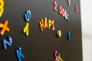 We practice letters, words, and colors on our magnetic chalkboard